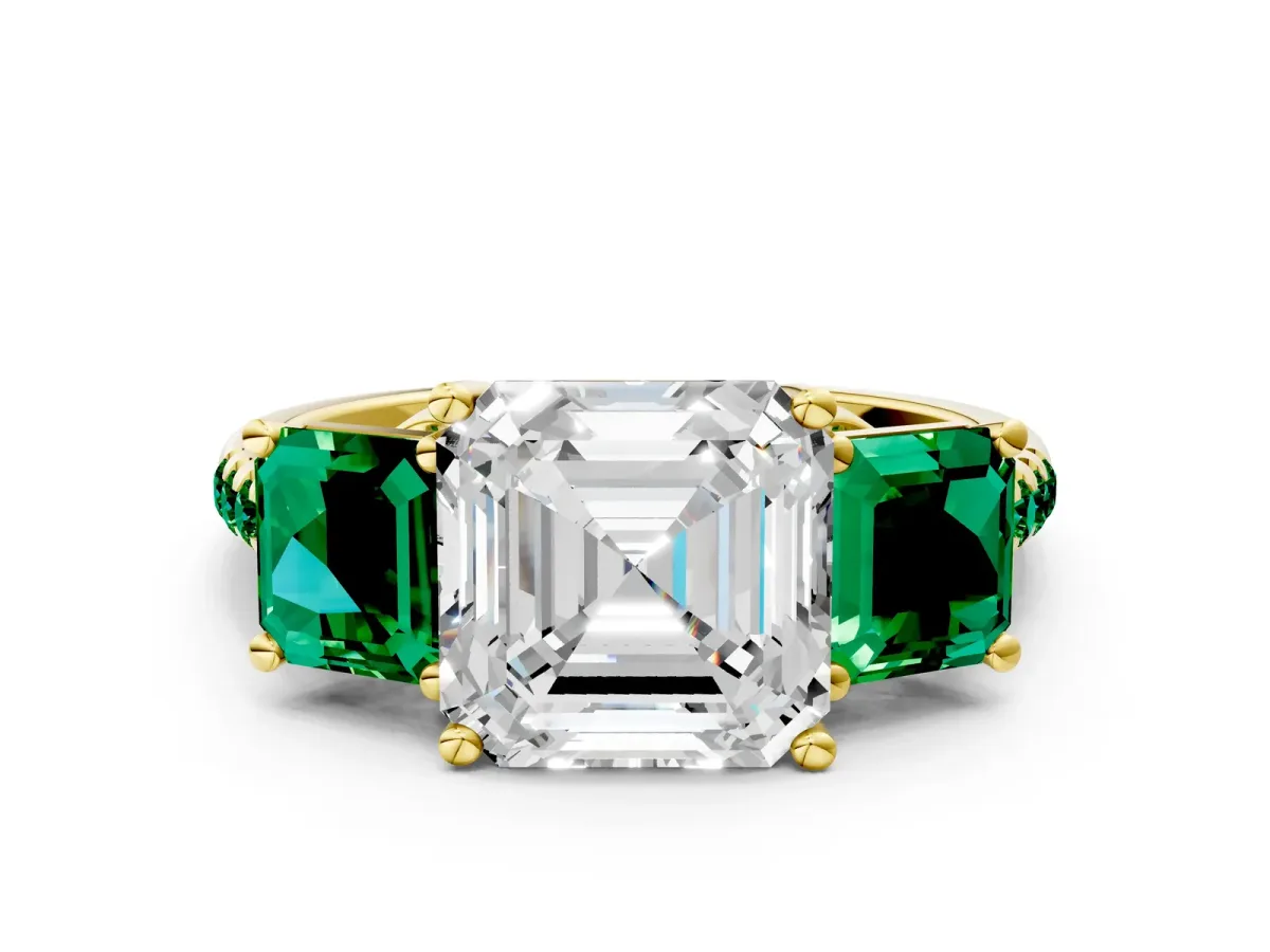 Three-Stone Asscher Cut Diamond Ring with Round Emerald Pavé Band and Prong Setting Yellow gold