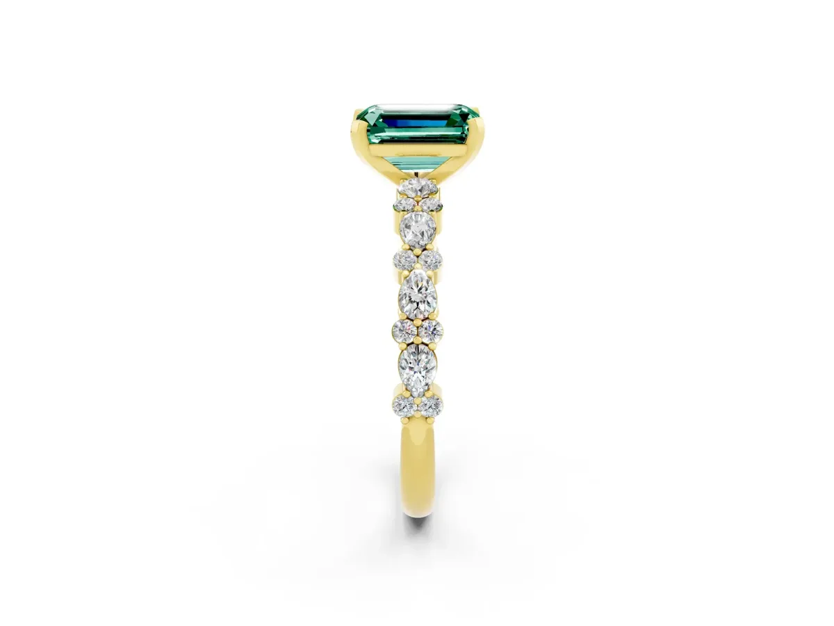 Emerald Cut Green Sapphire Side Stone Solitaire Ring with Round and Four-Prong Setting Yellow gold