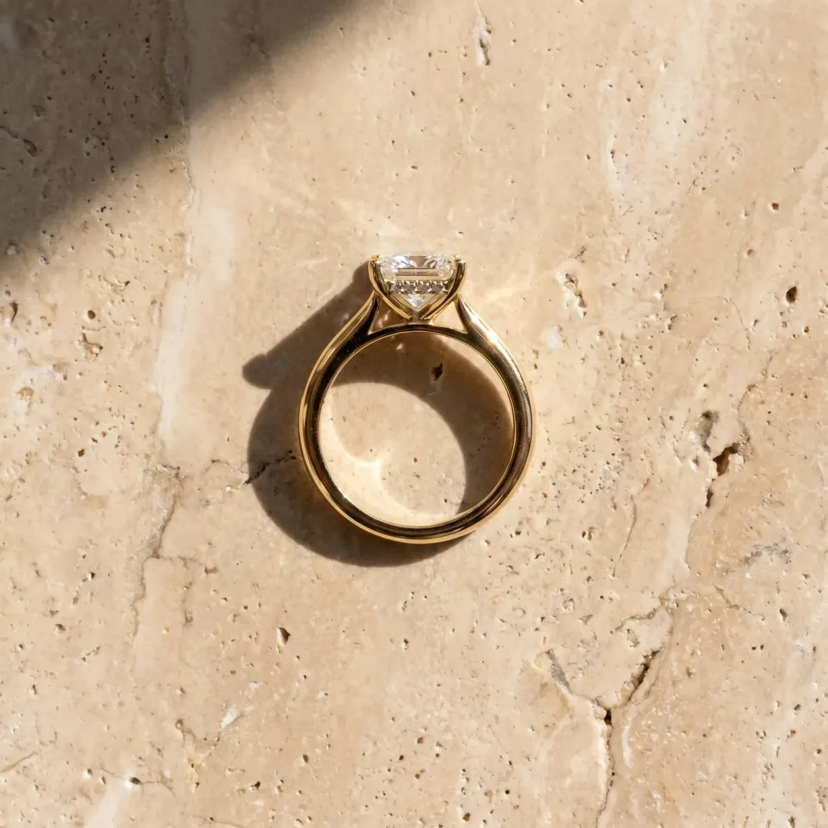 Princess Cut Diamond Solitaire Engagement Ring with Round Band and Four-Prong Setting Yellow gold