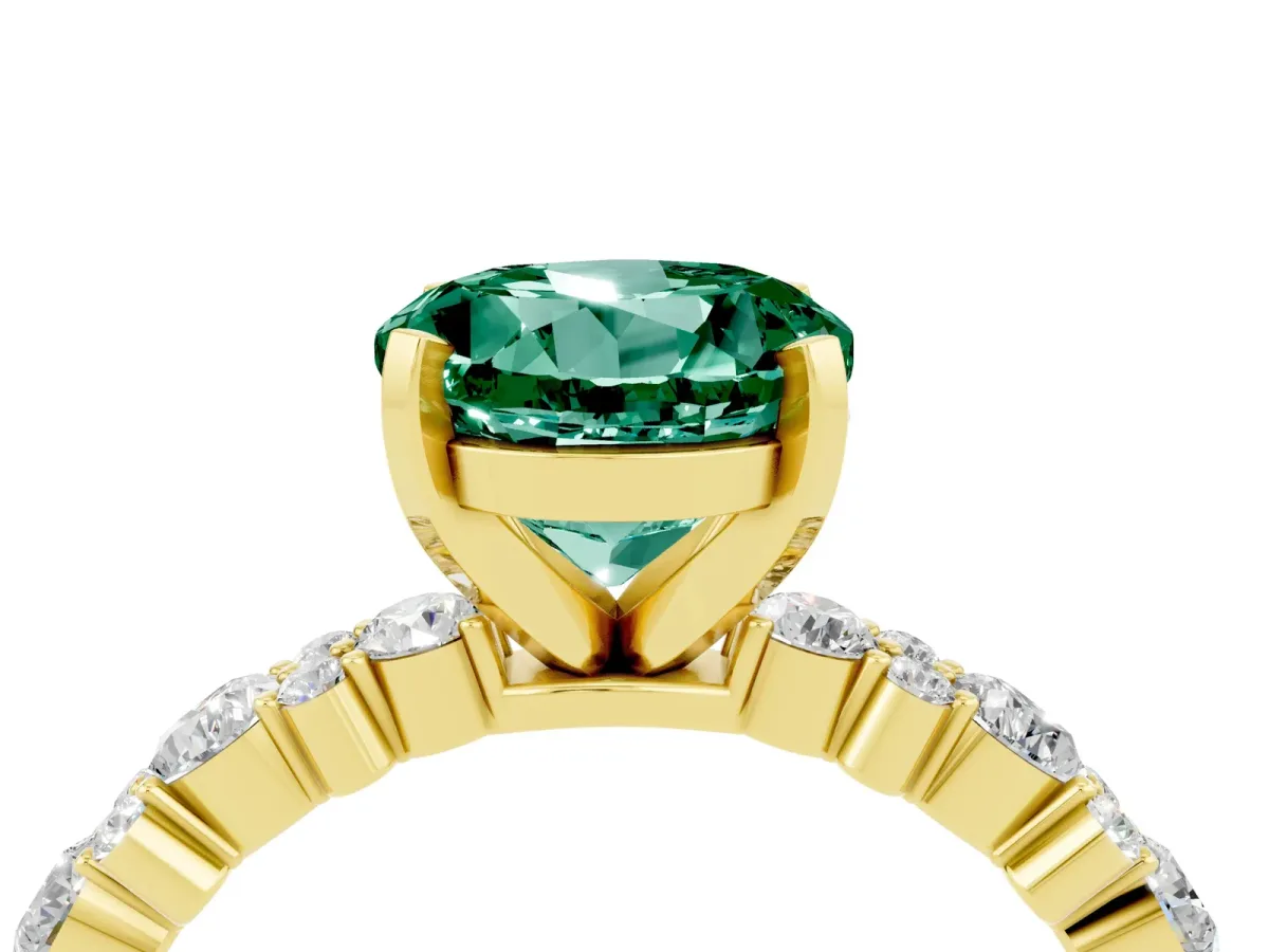 Round Cut Green Sapphire Side Stone Solitaire Ring with Round and Four-Prong Setting Yellow gold