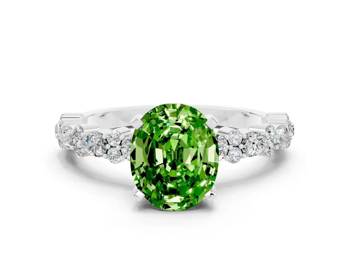 Oval Cut Peridot Side Stone Solitaire Ring with Round and Four-Prong Setting White gold