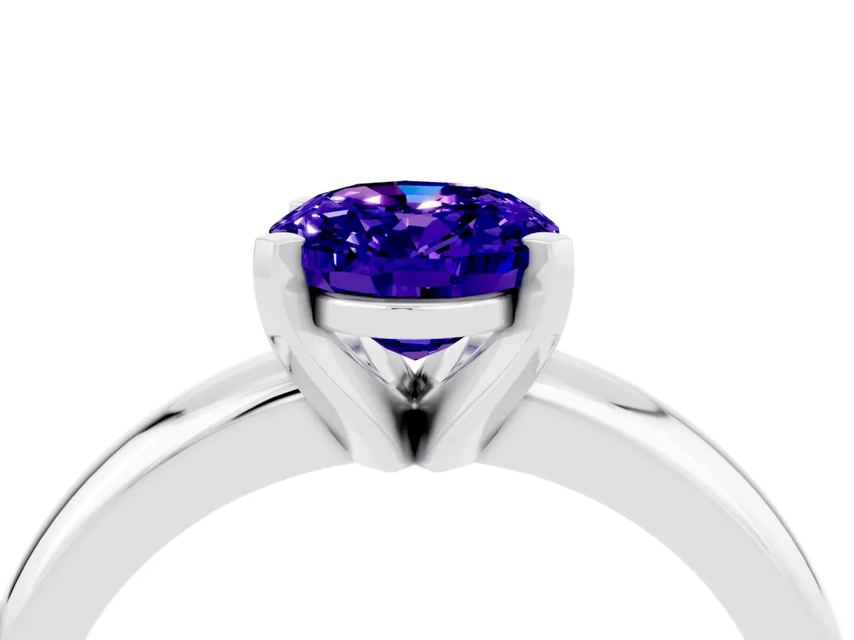 Oval Cut Tanzanite Solitaire Engagement Ring with Round Band and Four-Prong Setting Platinum