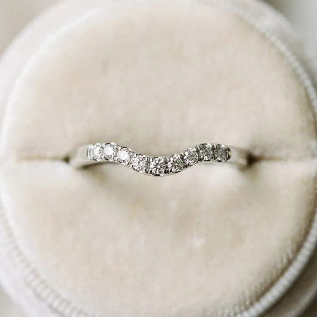 Curved Diamond Wedding Band with Round Cut Stones and Shared Prong Setting White gold