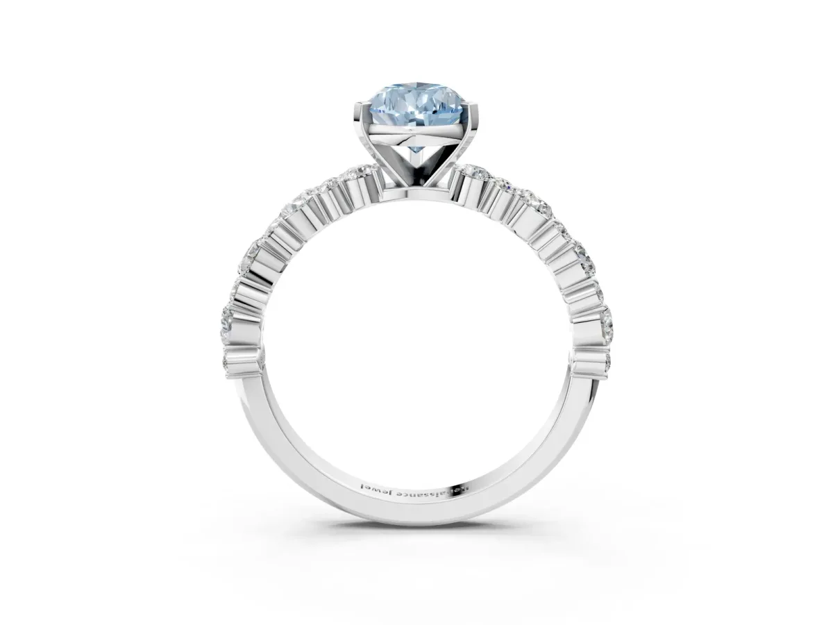 Fancy Blue Pear Cut Diamond Side Stone Solitaire Ring with Round and Four-Prong Setting Platinum
