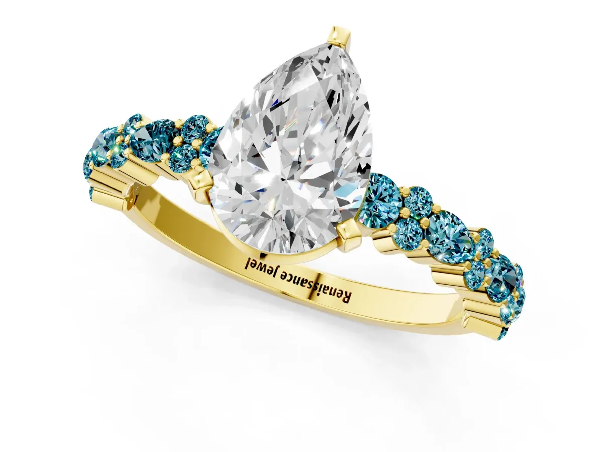 Pear Cut Diamond Side Stone Solitaire Ring with Round Blue Topaz and Four-Prong Setting Yellow gold