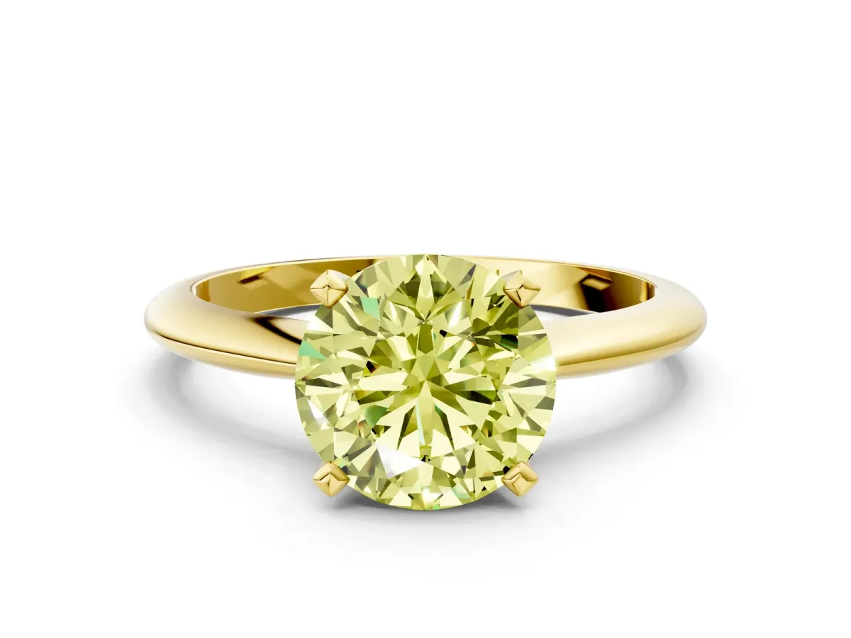 Fancy Yellow Round Cut Diamond Solitaire Engagement Ring with Classic Band and Four-Prong Setting Yellow gold