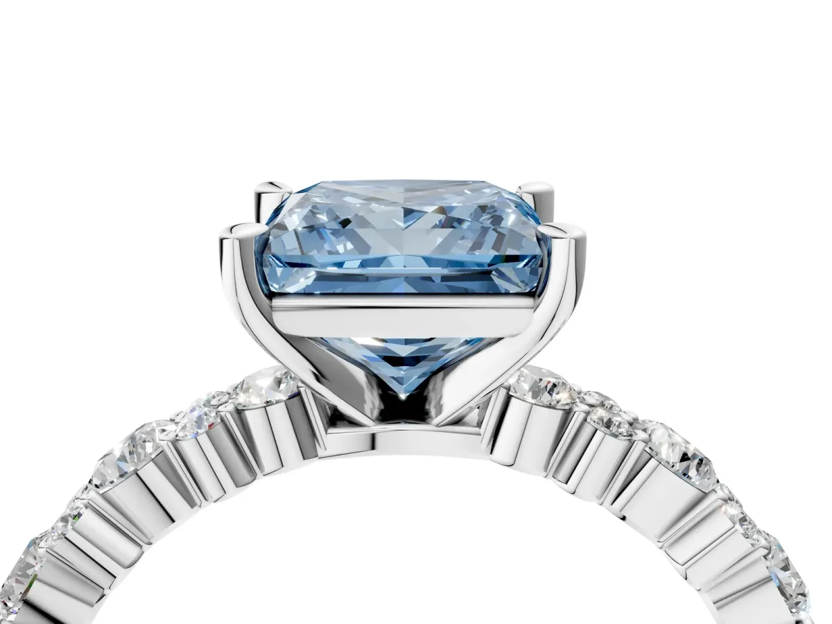 Fancy Blue Princess Cut Diamond Side Stone Solitaire Ring with Round and Four-Prong Setting Silver