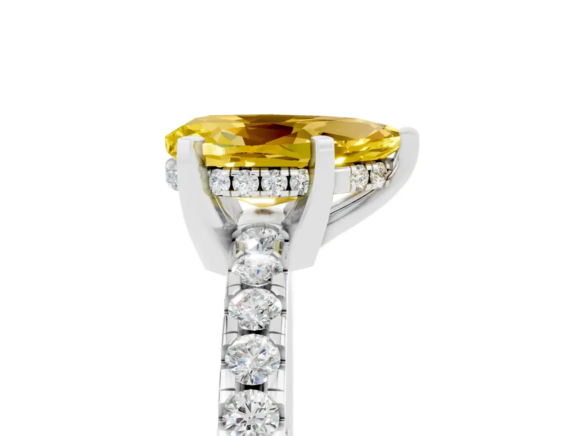 Pear Cut Yellow Sapphire Solitaire Ring with Round Pavé Band and Four-Prong Setting Platinum