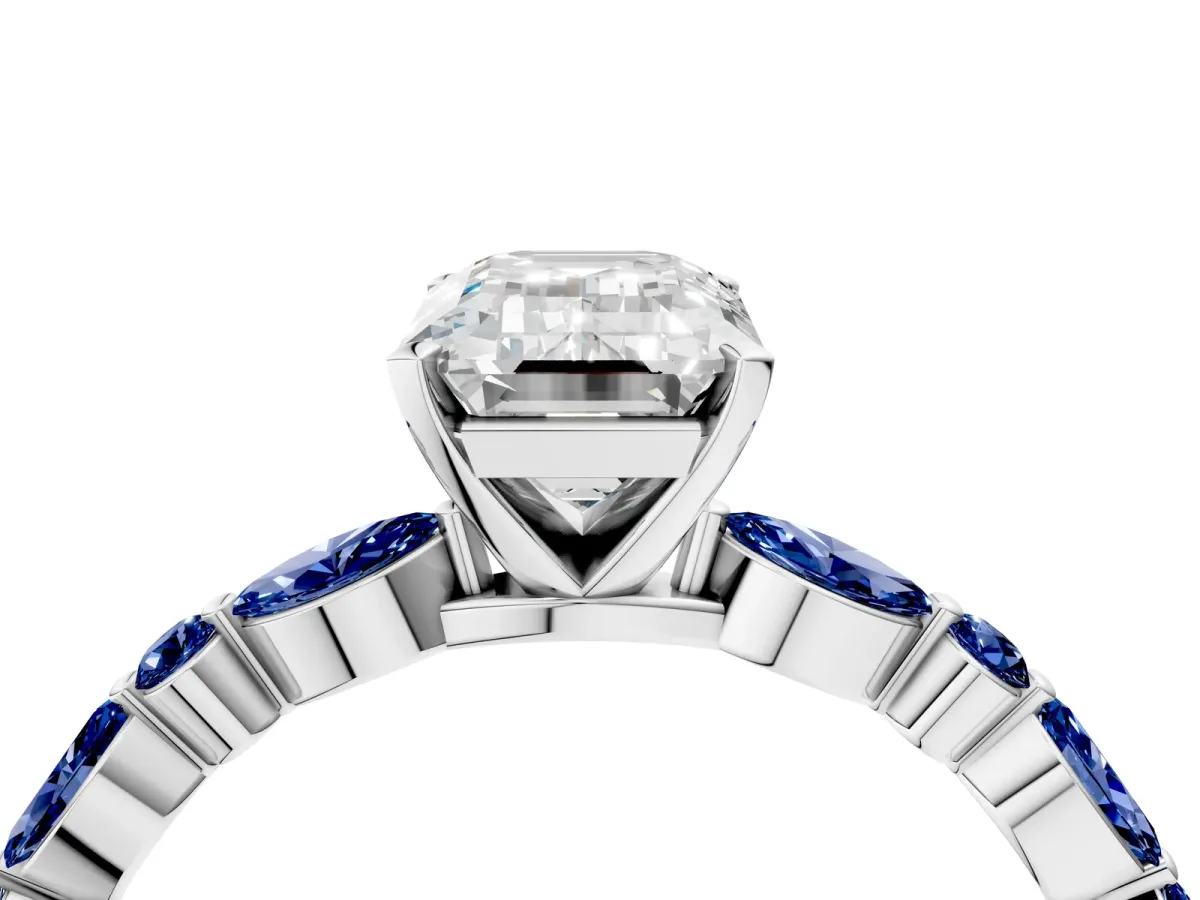 Emerald Cut Diamond Ring with Marquise and Round Blue Sapphire Side Stones and Four-Prong Setting Silver