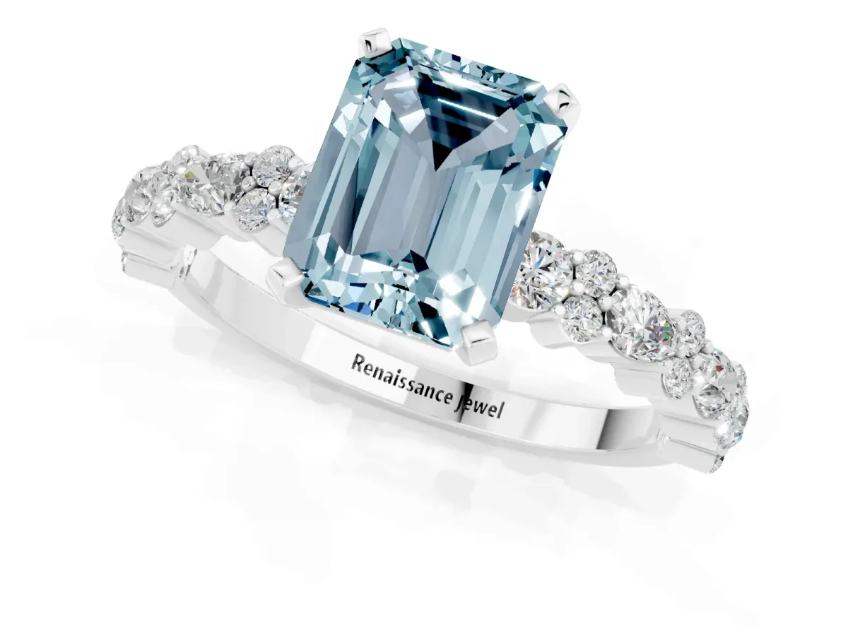 Emerald Cut Aquamarine Side Stone Solitaire Ring with Round and Four-Prong Setting White gold