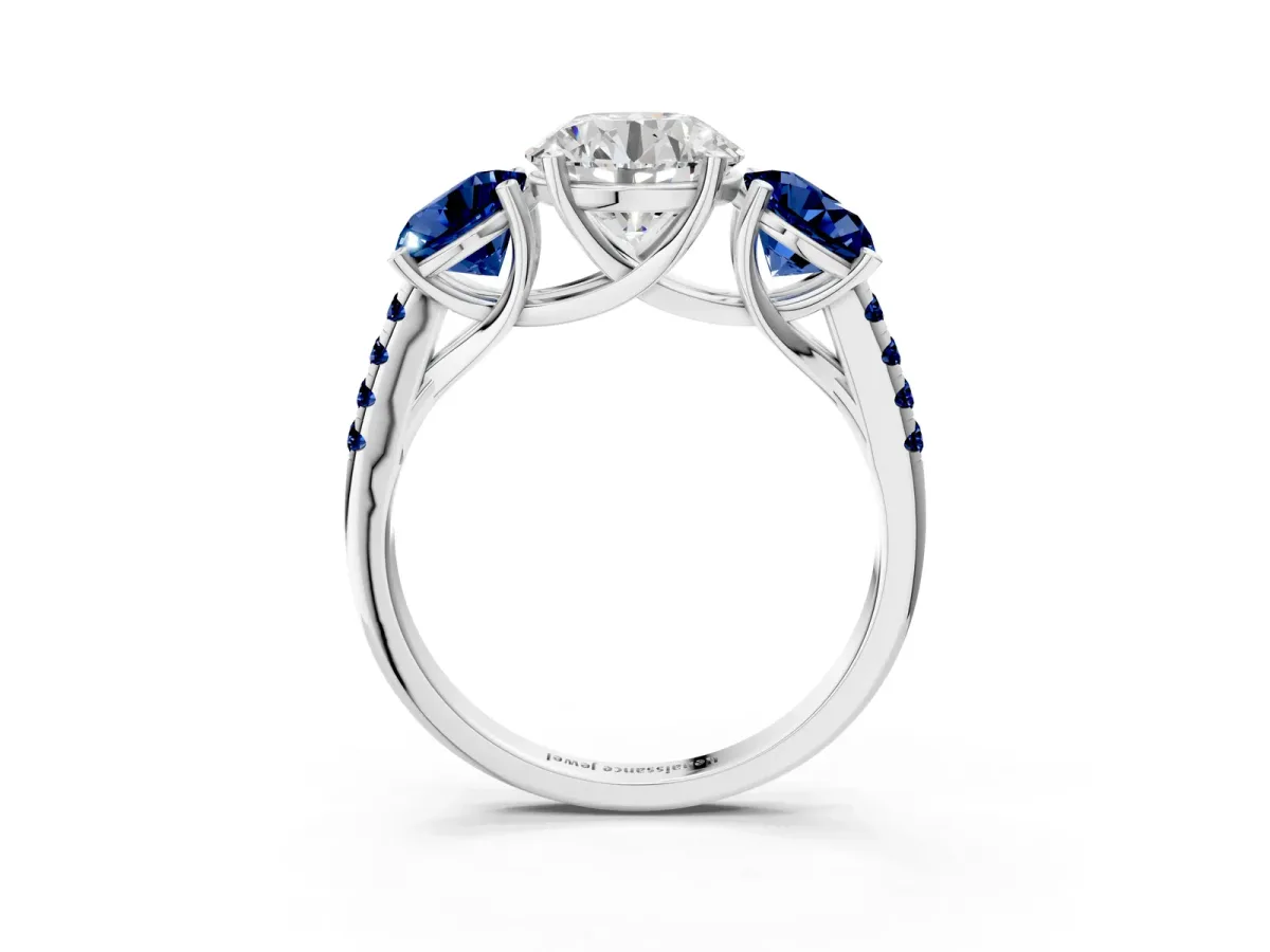Three-Stone Round Cut Diamond Ring with Round Blue Sapphire Pavé Band and Prong Setting White gold
