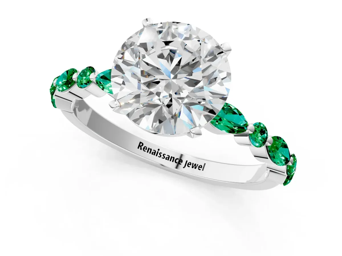 Round Cut Diamond Ring with Marquise and Round Emerald Side Stones and Four-Prong Setting Platinum