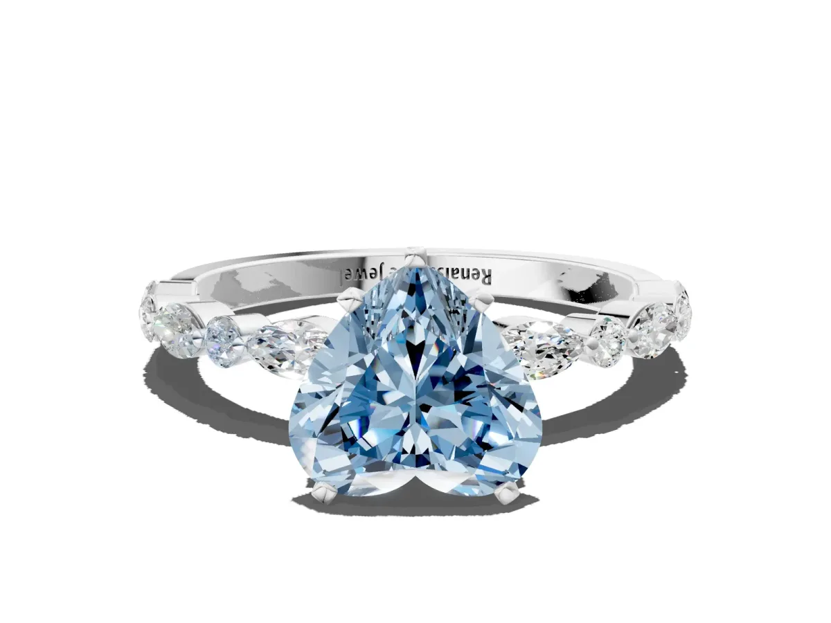 Fancy Blue Heart Cut Diamond Ring with Marquise and Round Side Stones and Four-Prong Setting Silver