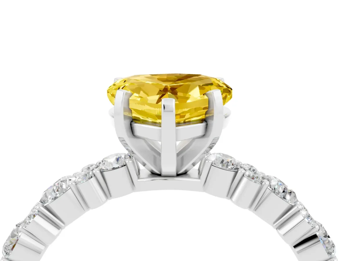 Heart Cut Yellow Sapphire Side Stone Solitaire Ring with Round and Four-Prong Setting Platinum