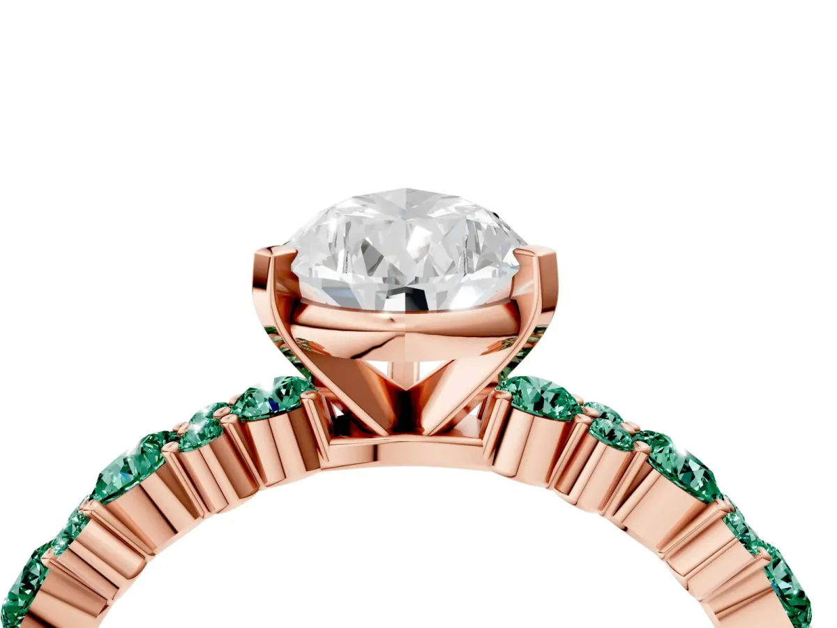 Pear Cut Diamond Side Stone Solitaire Ring with Round Green Sapphire and Four-Prong Setting Rose gold