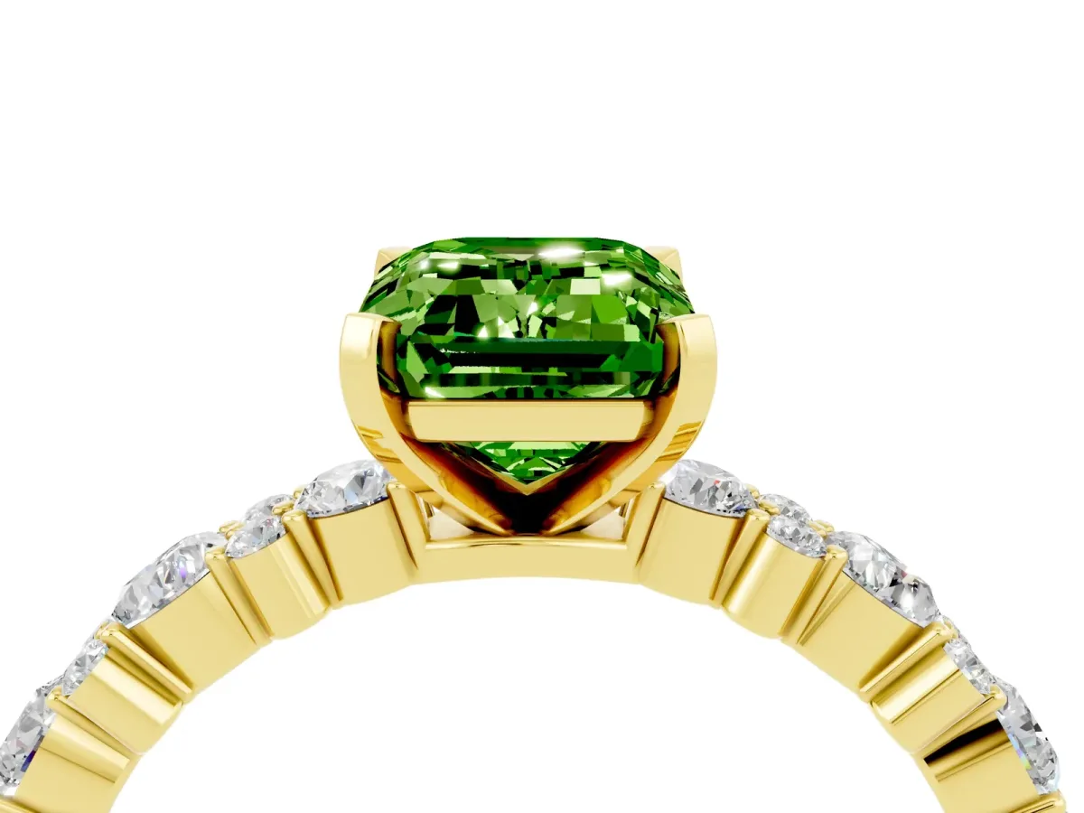 Emerald Cut Peridot Side Stone Solitaire Ring with Round and Four-Prong Setting Yellow gold