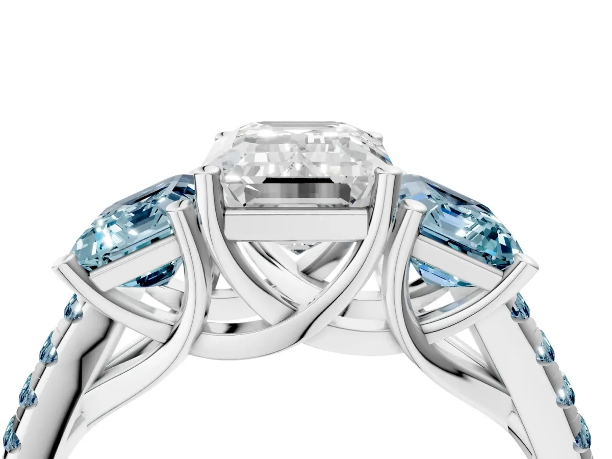 Three-Stone Emerald Cut Diamond Ring with Round Aquamarine Pavé Band and Prong Setting Platinum