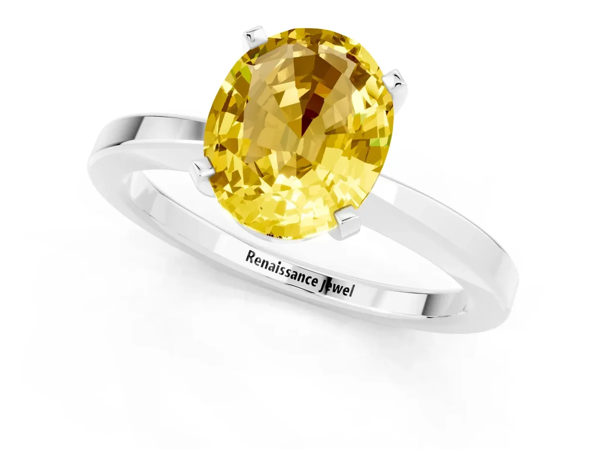 Oval Cut Yellow Sapphire Solitaire Engagement Ring with Classic Band and Four-Prong Setting Silver