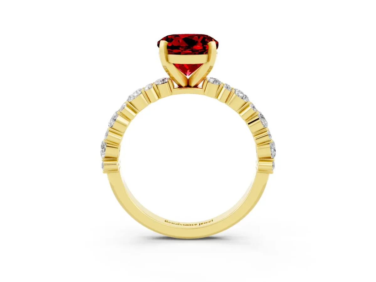 Round Cut Ruby Side Stone Solitaire Ring with Round and Four-Prong Setting Yellow gold