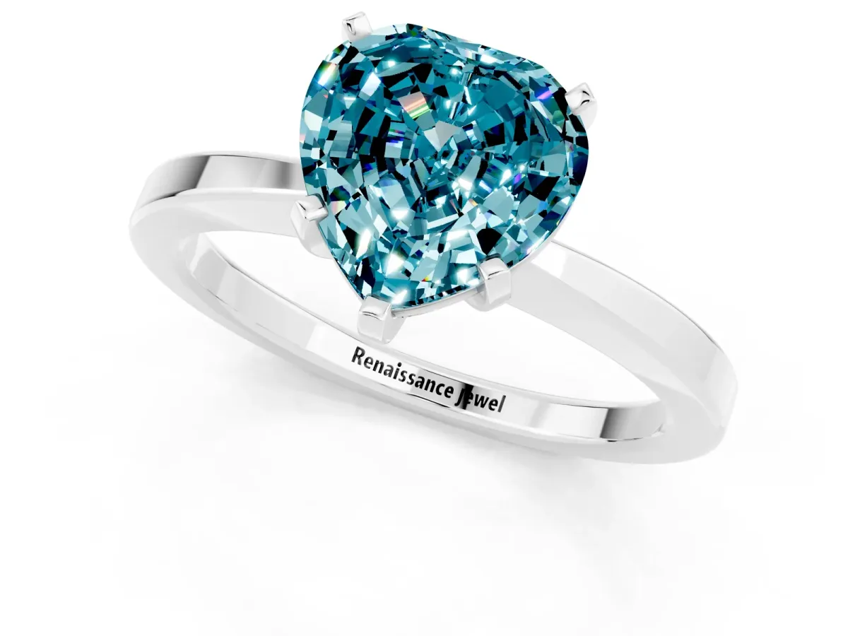 Heart Cut Blue Topaz Solitaire Engagement Ring with Classic Band and Four-Prong Setting Silver