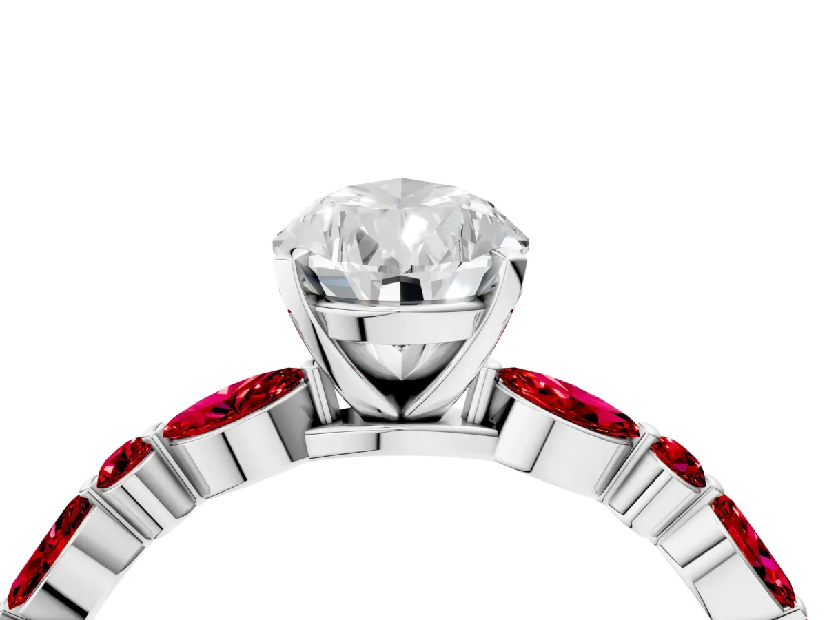 Pear Cut Diamond Ring with Marquise and Round Ruby Side Stones and Four-Prong Setting Platinum