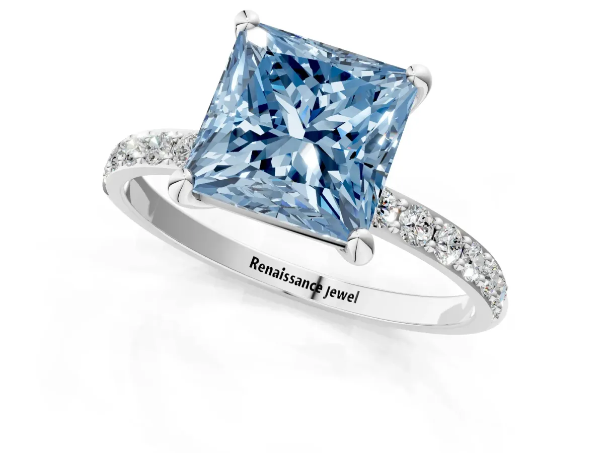 Fancy Blue Princess Cut Diamond Solitaire Ring with Round Pavé Band and Prong Setting White gold
