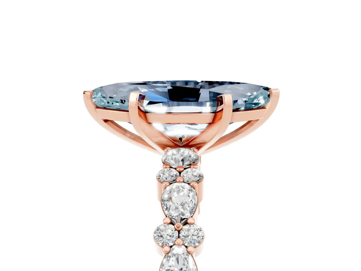 Marquise Cut Aquamarine Side Stone Solitaire Ring with Round and Four-Prong Setting Rose gold