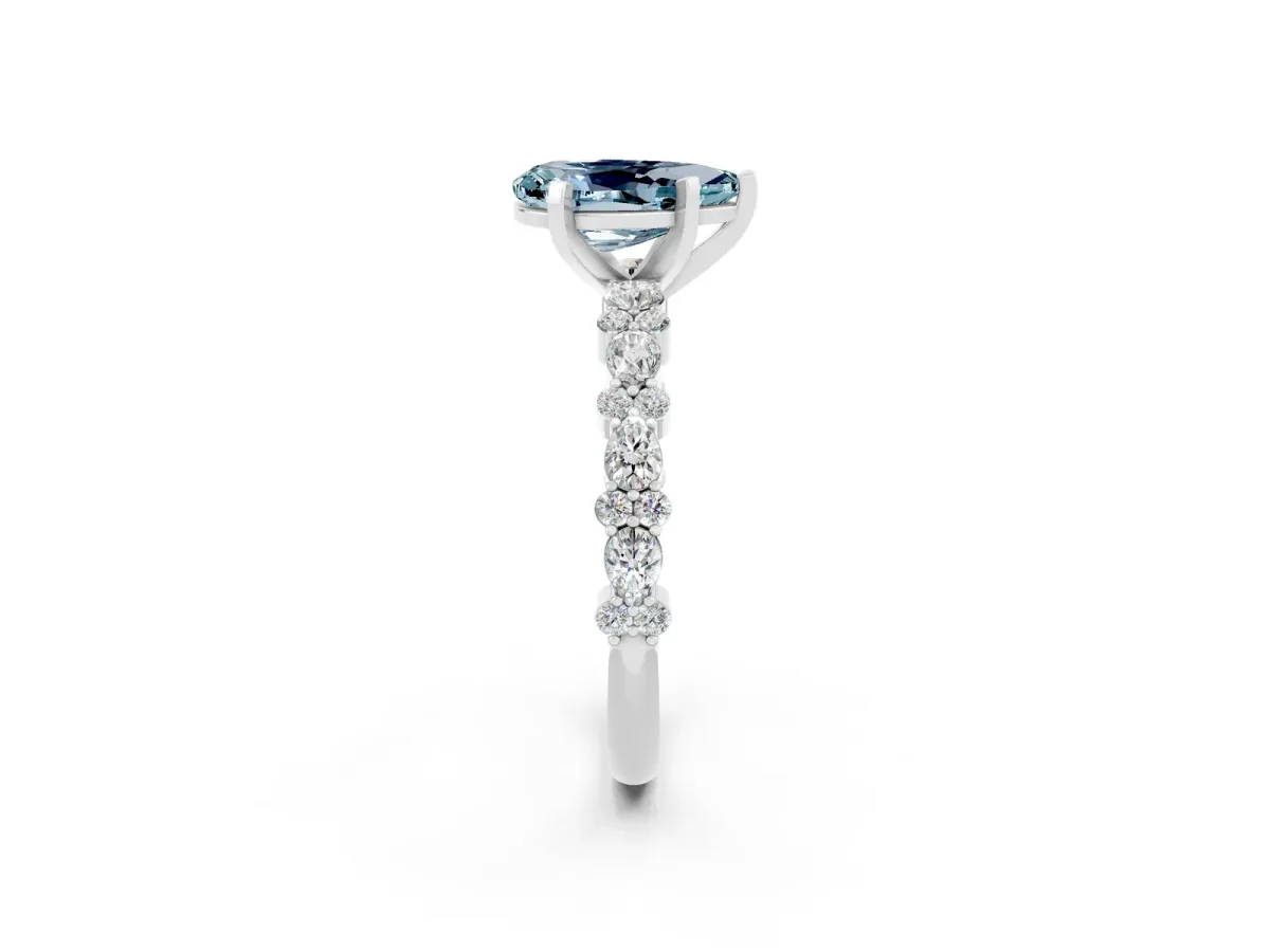 Pear Cut Aquamarine Side Stone Solitaire Ring with Round and Four-Prong Setting White gold
