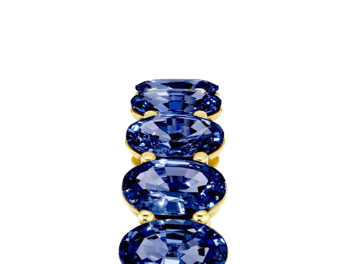 Oval Cut Blue Sapphire Eternity Band with Shared Prong Setting Yellow gold