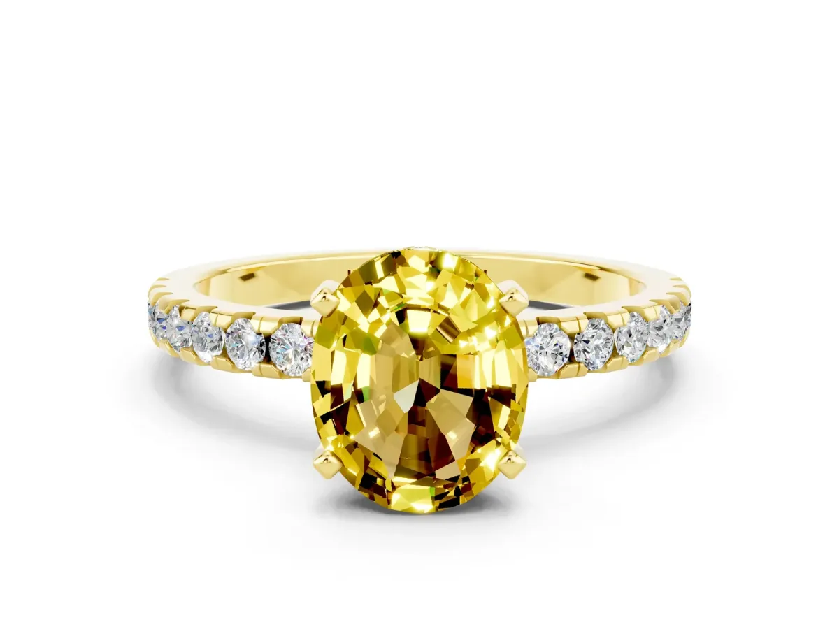 Oval Cut Yellow Sapphire Solitaire Ring with Round Pavé Band and Four-Prong Setting Yellow gold