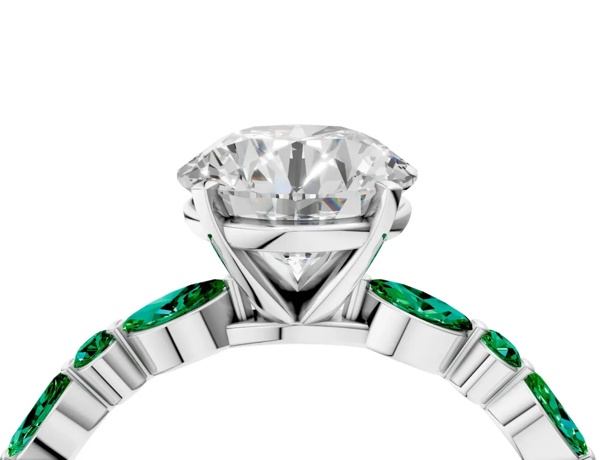 Round Cut Diamond Ring with Marquise and Round Emerald Side Stones and Four-Prong Setting Platinum