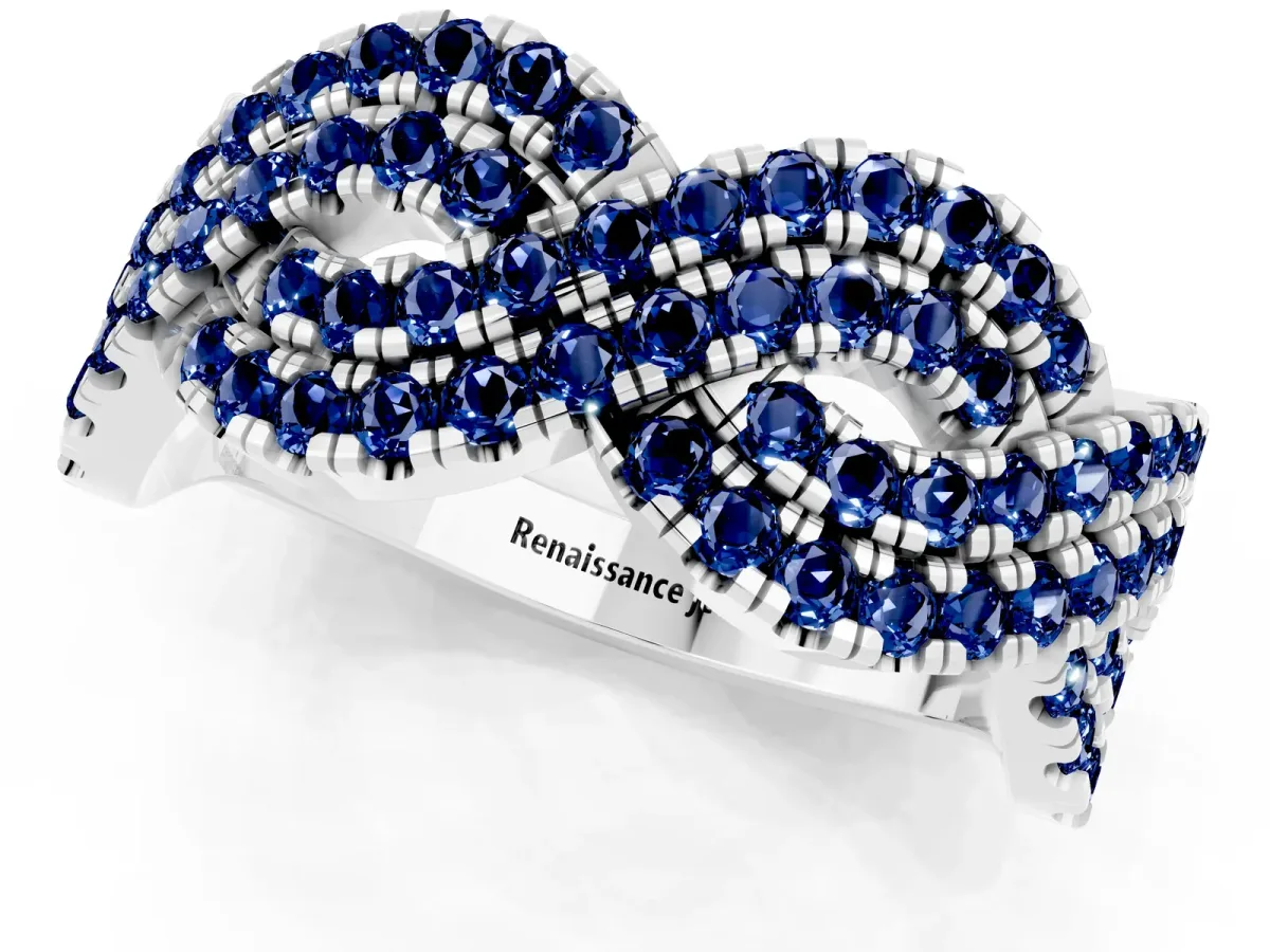 Pavé Round Blue Sapphire Infinity Twist Band with Shared Prong Setting White gold