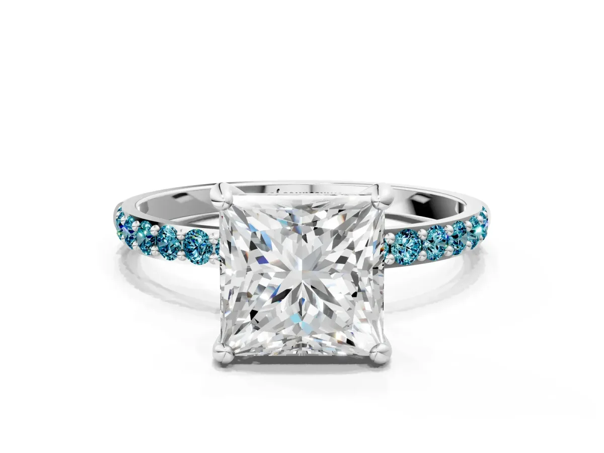 Princess Cut Diamond Solitaire Ring with Round Blue Topaz Pavé Band and Prong Setting Silver