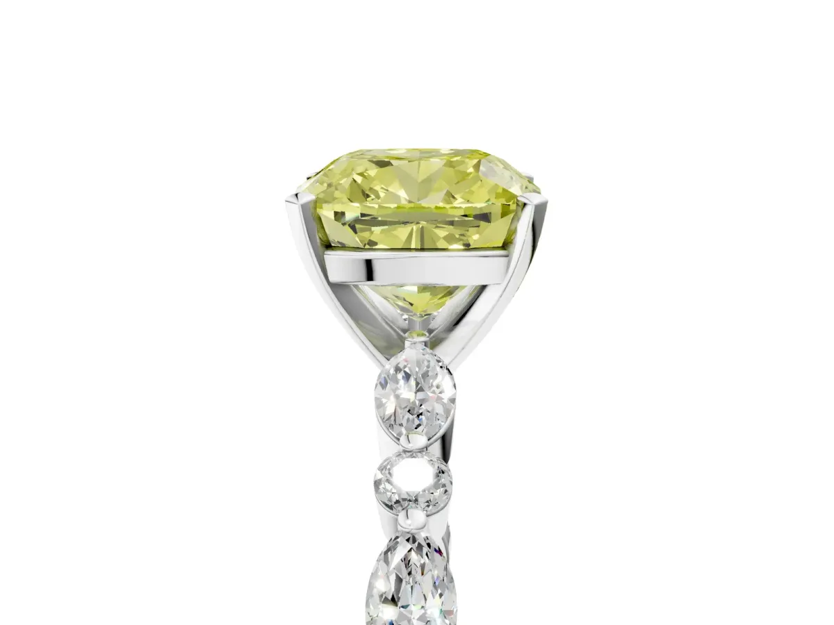 Fancy Yellow Cushion Cut Diamond Ring with Marquise and Round Side Stones and Four-Prong Setting Silver