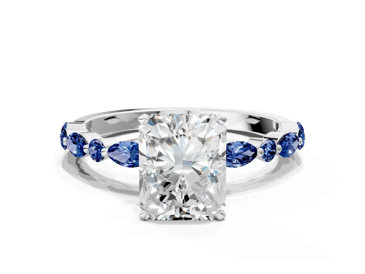 Radiant Cut Diamond Ring with Marquise and Round Blue Sapphire Side Stones and Four-Prong Setting Silver
