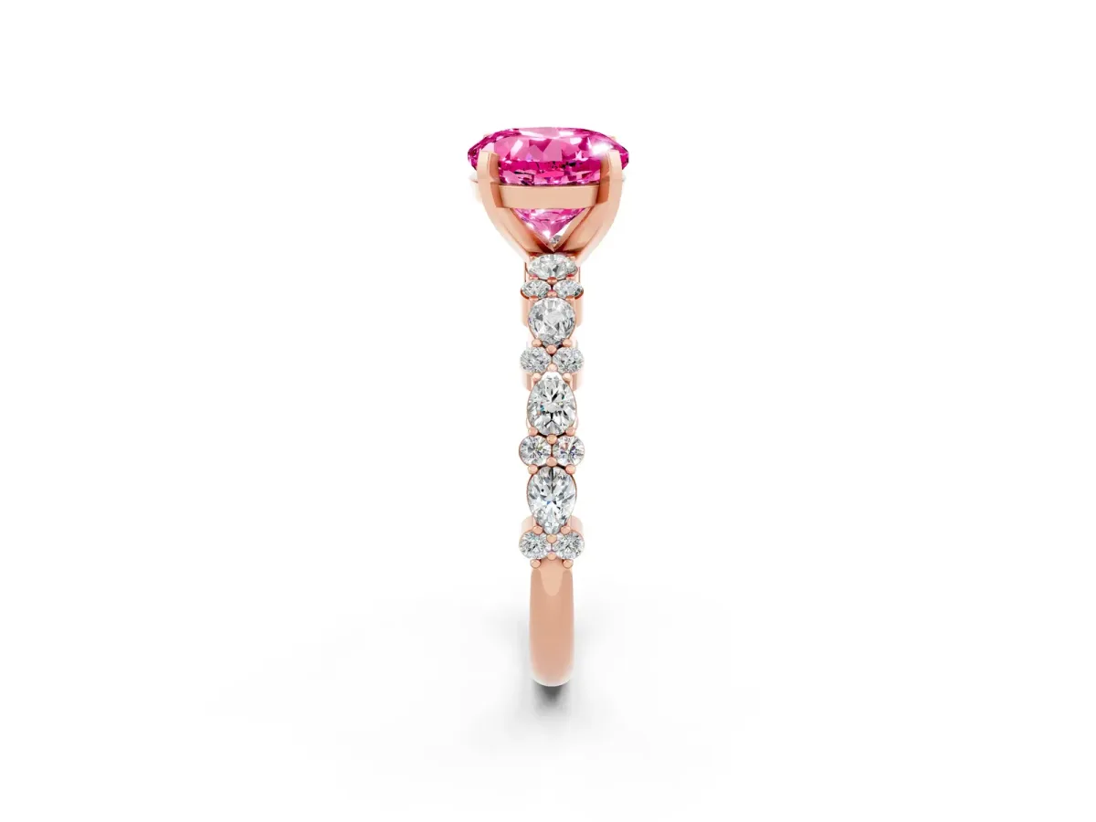 Round Cut Pink Sapphire Side Stone Solitaire Ring with Round and Four-Prong Setting Rose gold