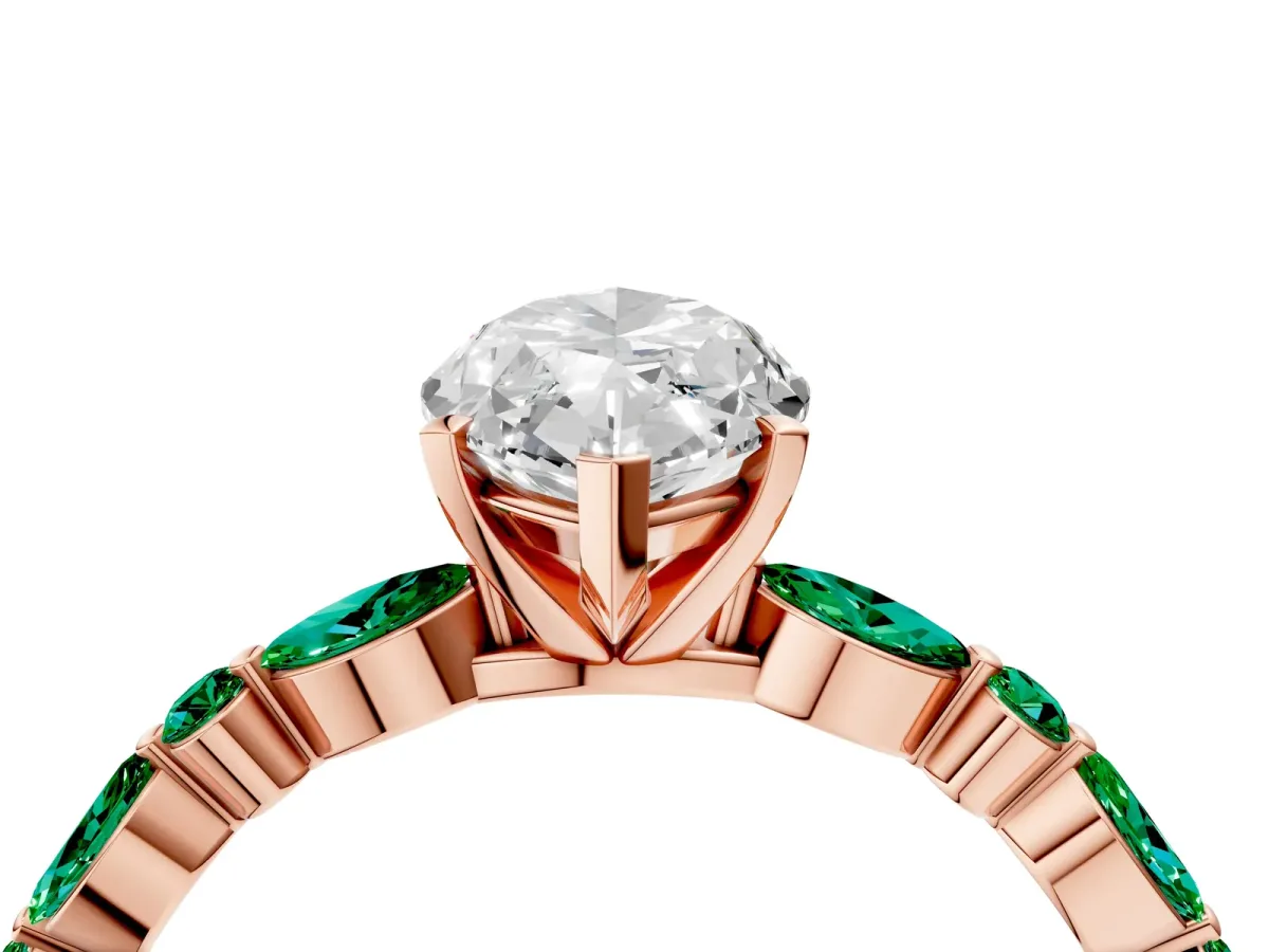 Marquise Cut Diamond Ring with Marquise and Round Emerald Side Stones and Four-Prong Setting Rose gold