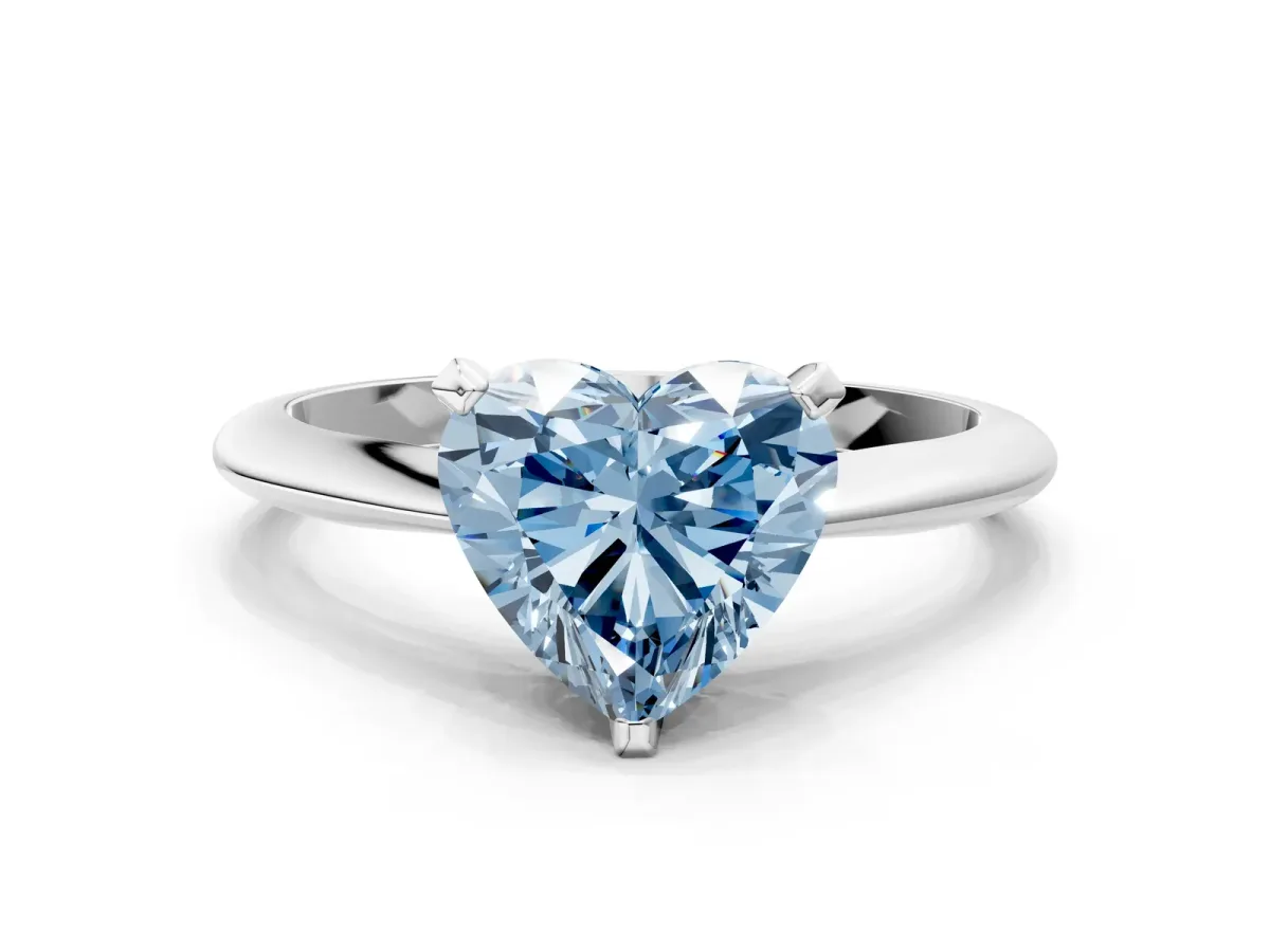 Fancy Blue Heart Cut Diamond Solitaire Engagement Ring with Classic Band and Four-Prong Setting Silver