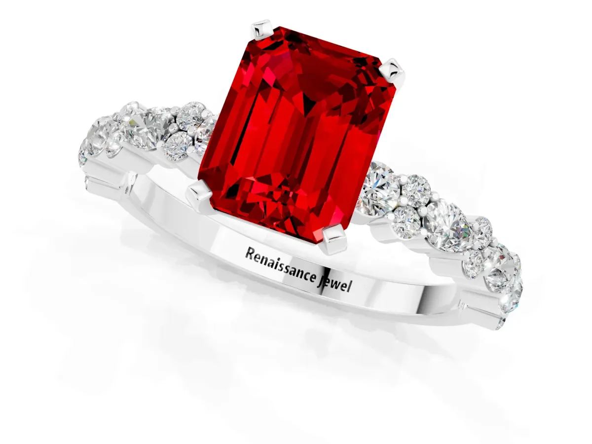Emerald Cut Ruby Side Stone Solitaire Ring with Round and Four-Prong Setting White gold