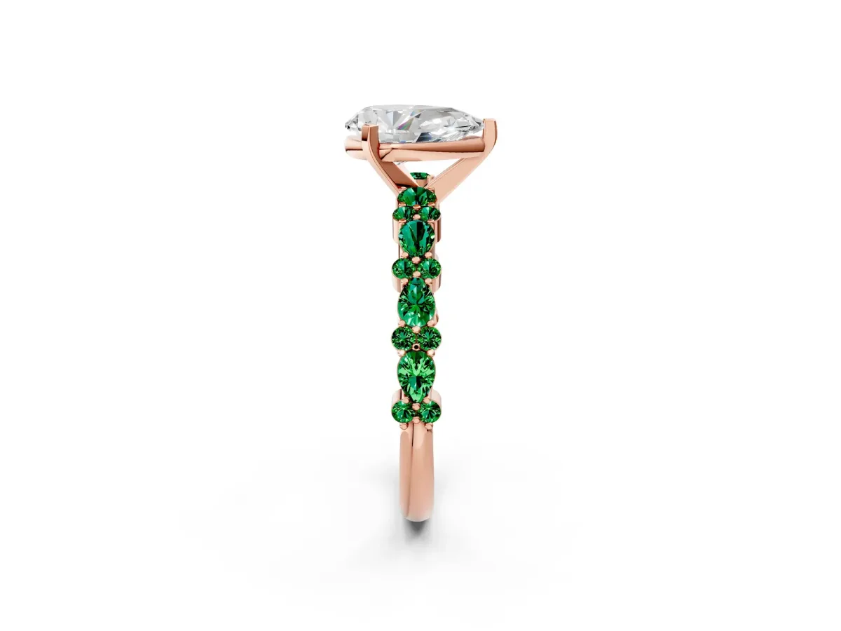 Pear Cut Diamond Side Stone Solitaire Ring with Round Emerald and Four-Prong Setting Rose gold