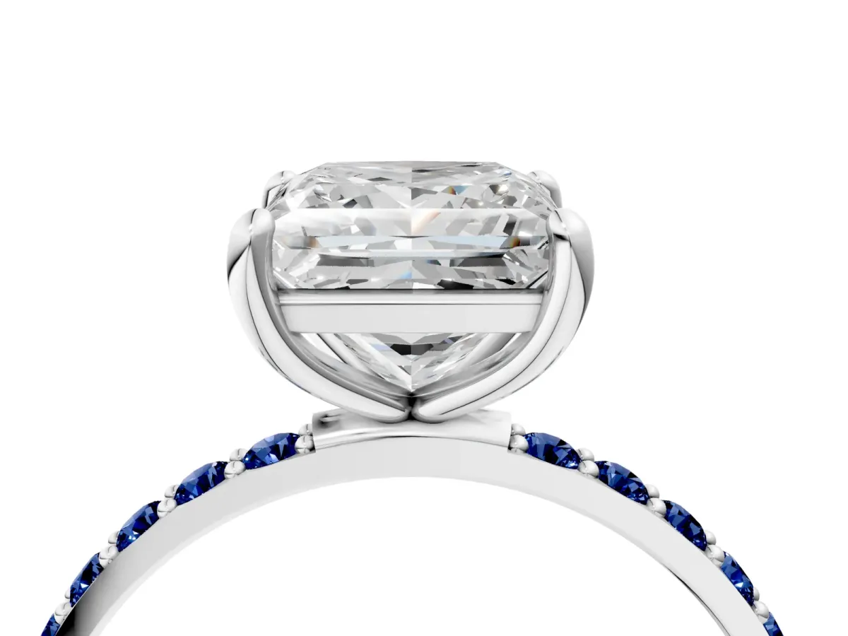 Princess Cut Diamond Solitaire Ring with Round Blue Sapphire Pavé Band and Prong Setting Silver