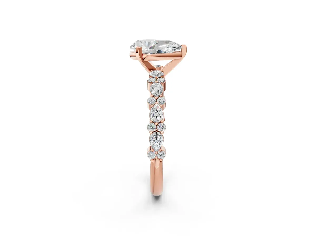 Pear Cut Diamond Side Stone Solitaire Ring with Round Moissanite and Four-Prong Setting Rose gold