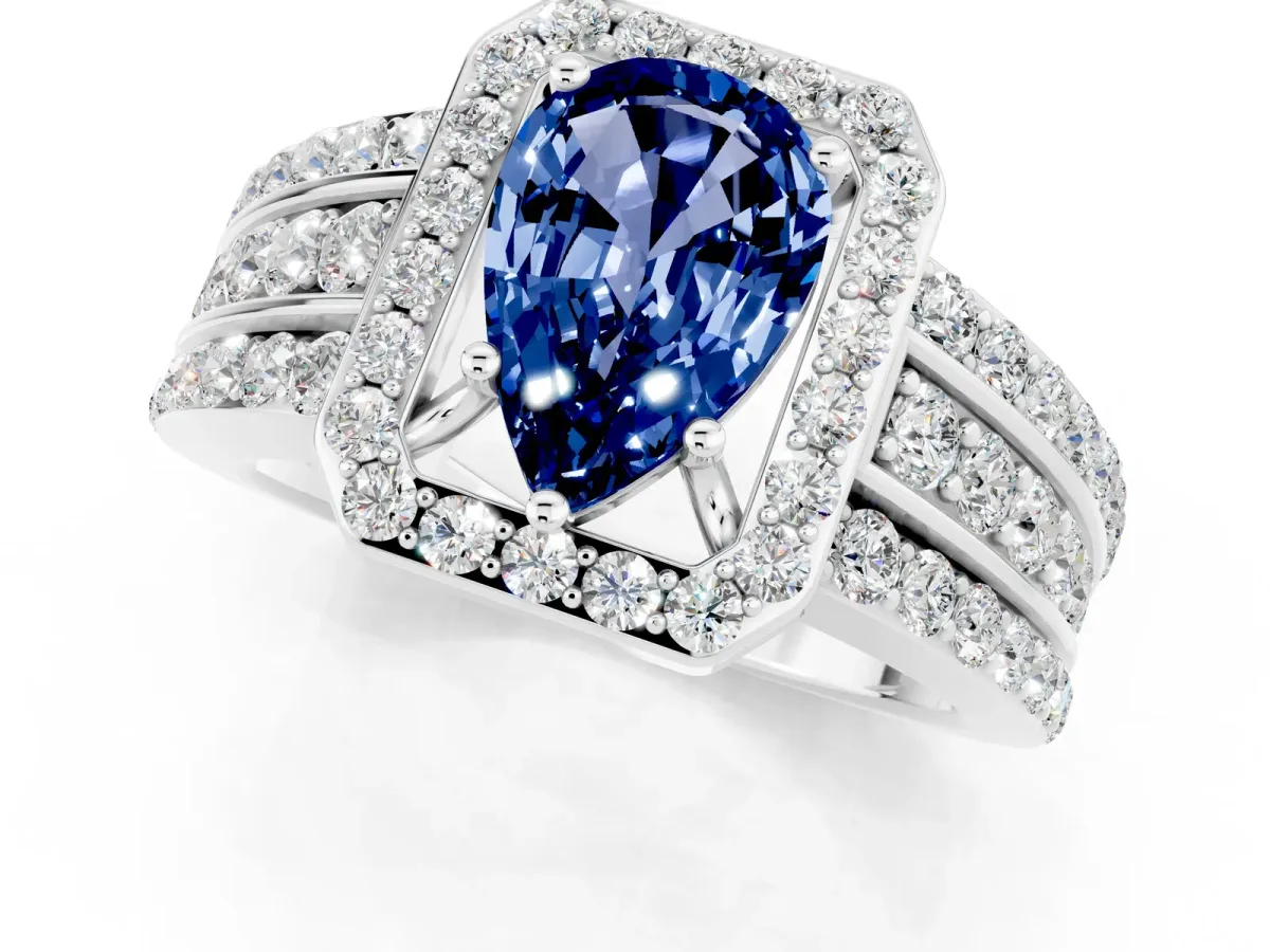 Pear Cut Halo Blue Sapphire Ring with Round Split Shank and Prong Setting Silver