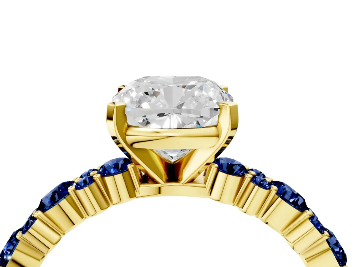 Cushion Cut Diamond Side Stone Solitaire Ring with Round Blue Sapphire and Four-Prong Setting Yellow gold