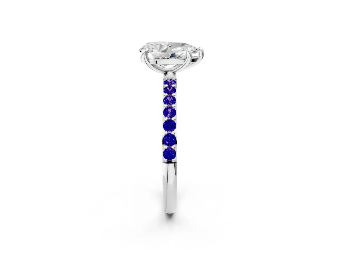 Pear Cut Diamond Solitaire Ring with Round Tanzanite Pavé Band and Prong Setting Platinum