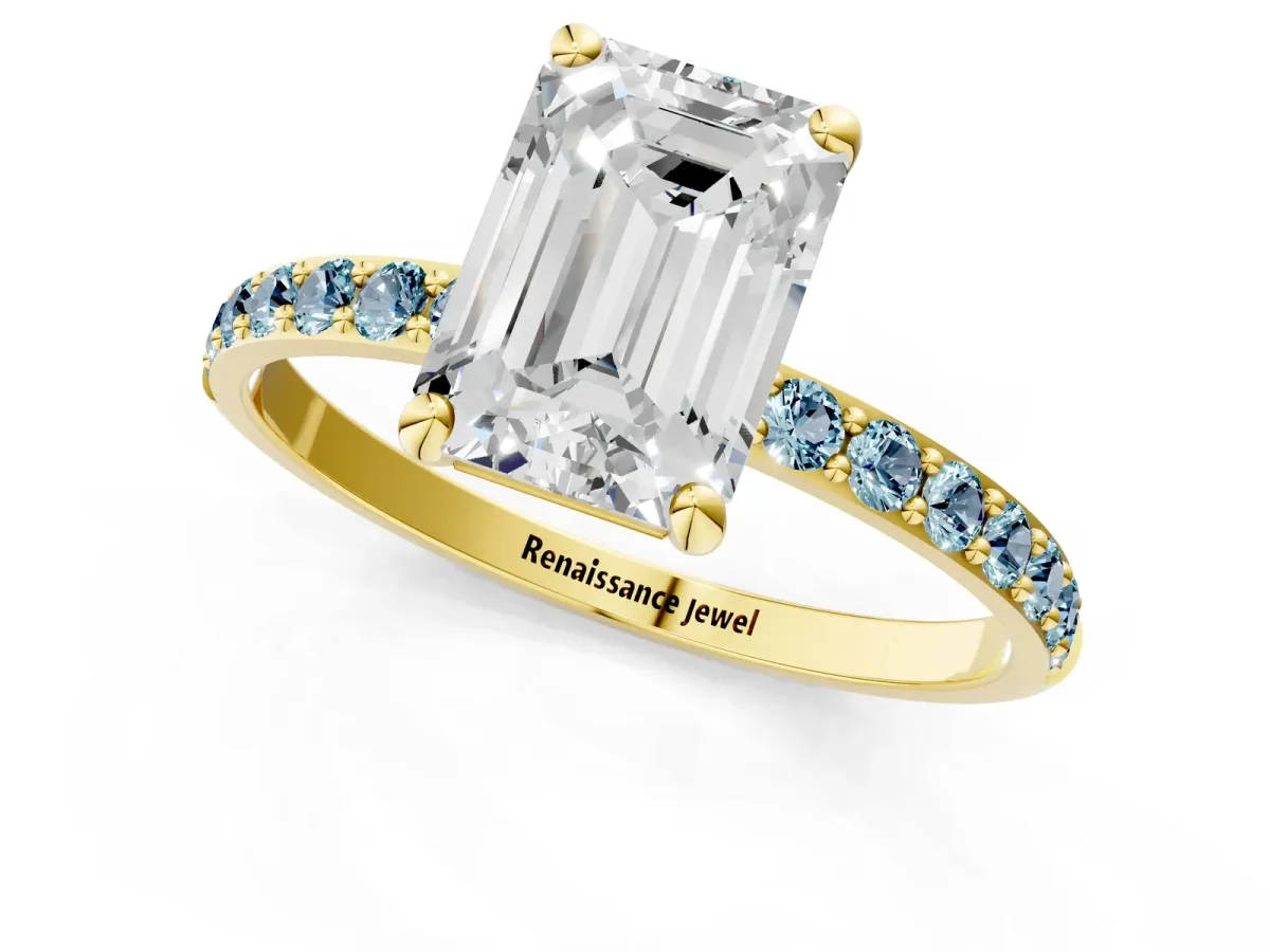 Emerald Cut Diamond Solitaire Ring with Round Aquamarine Pavé Band and Prong Setting Yellow gold