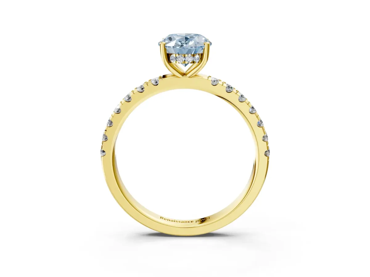 Fancy Blue Oval Cut Diamond Pave Band Solitaire Ring with Round and Prong Setting Yellow gold
