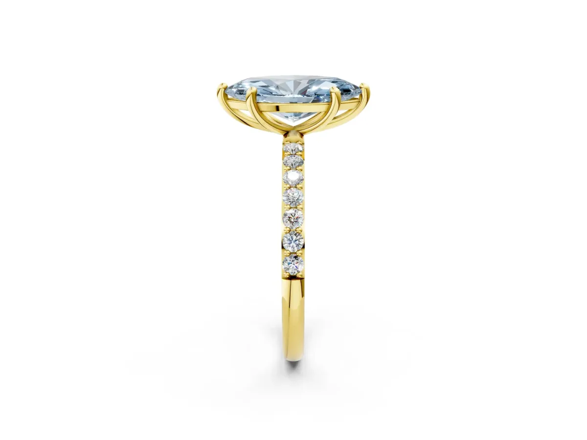 Fancy Blue Marquise Cut Diamond Solitaire Ring with Round Pavé Band and Prong Setting Yellow gold