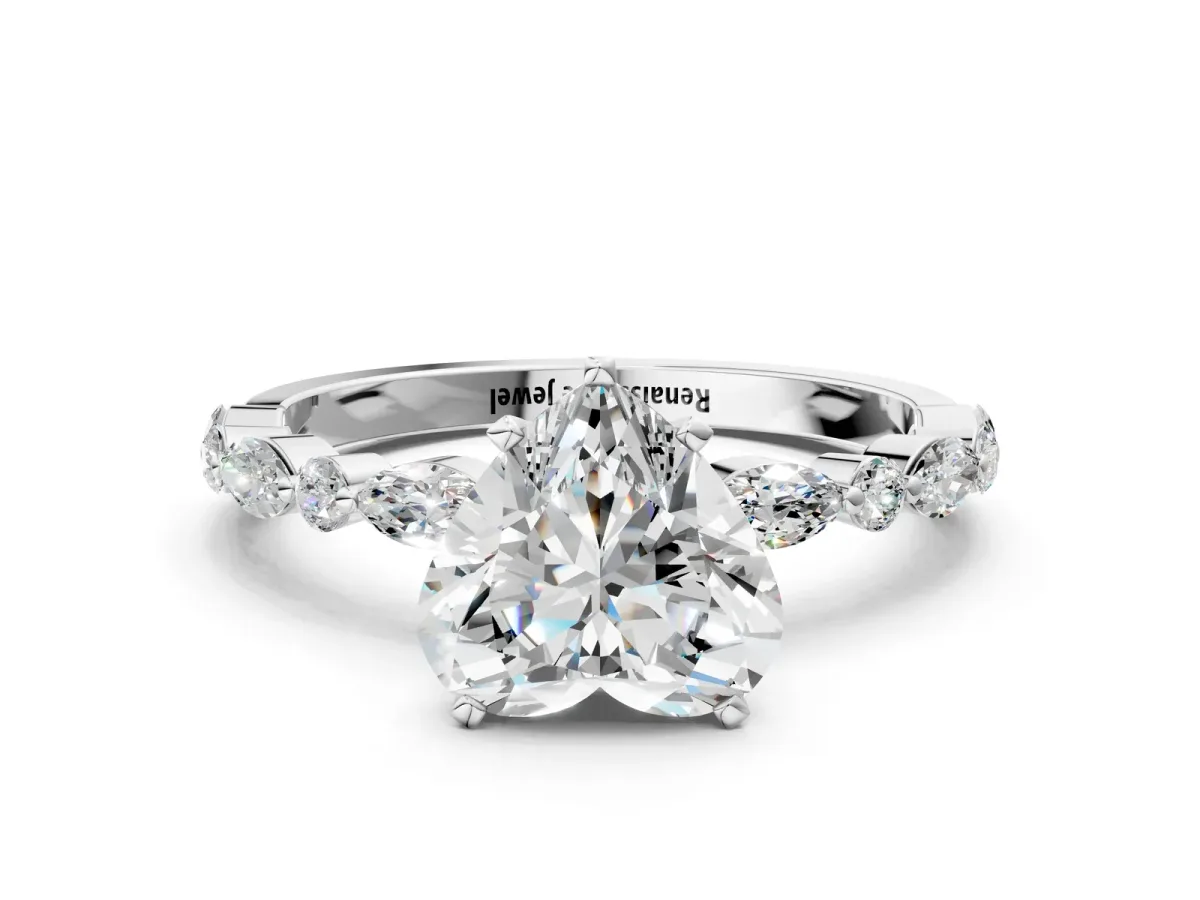 Heart Cut Diamond Ring with Marquise and Round Side Stones and Four-Prong Setting Platinum