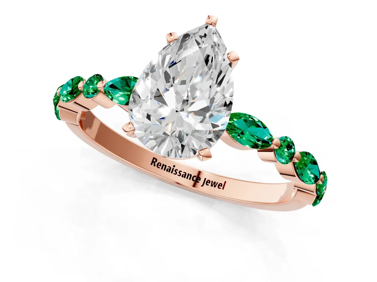 Pear Cut Diamond Ring with Marquise and Round Emerald Side Stones and Four-Prong Setting Rose gold